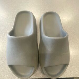 Onyx Yeezy Slides for sale.